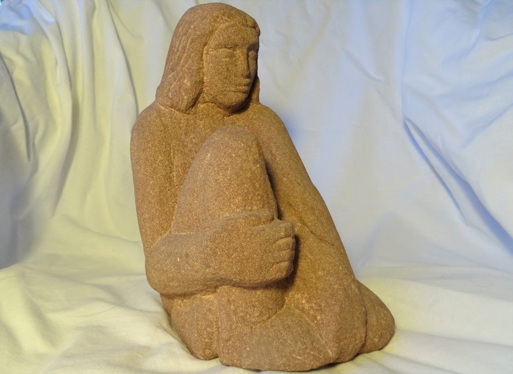 'seated Woman' sculpture by Jonah Jones