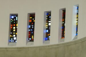 Jonah Jones slab-glass windows in Ratcliffe College chapel nave