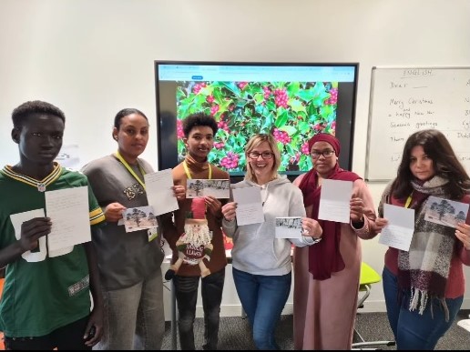 ESOL students at Cardiff and Vale College, with Jonah Jones cards donated by Scene & Word